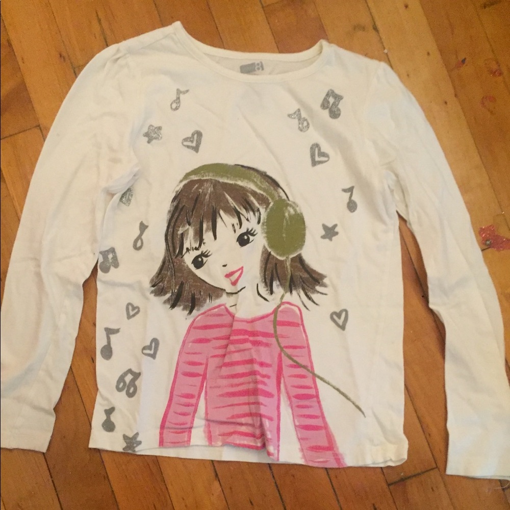 A white shirt with a girl listening to music!